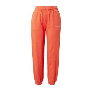 LACOSTE Kalhoty oranžová / pastelově růžová